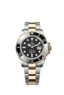 Rolex Sea-Dweller yellow gold Bezel and black dial